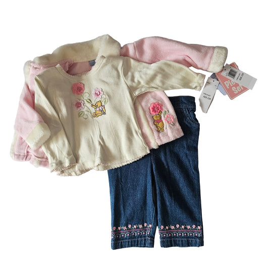 Children's clothing set with a shirt, pants, and pink jacket on a white background
